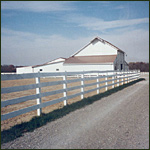  - Old barn (1928 and access drive looking West. Click to Enlarge